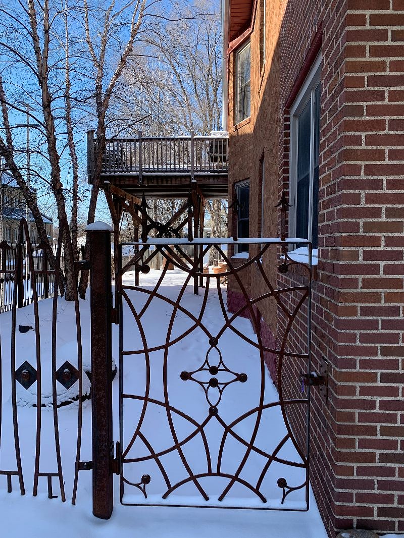 Custom gate and metal fence built by local artist