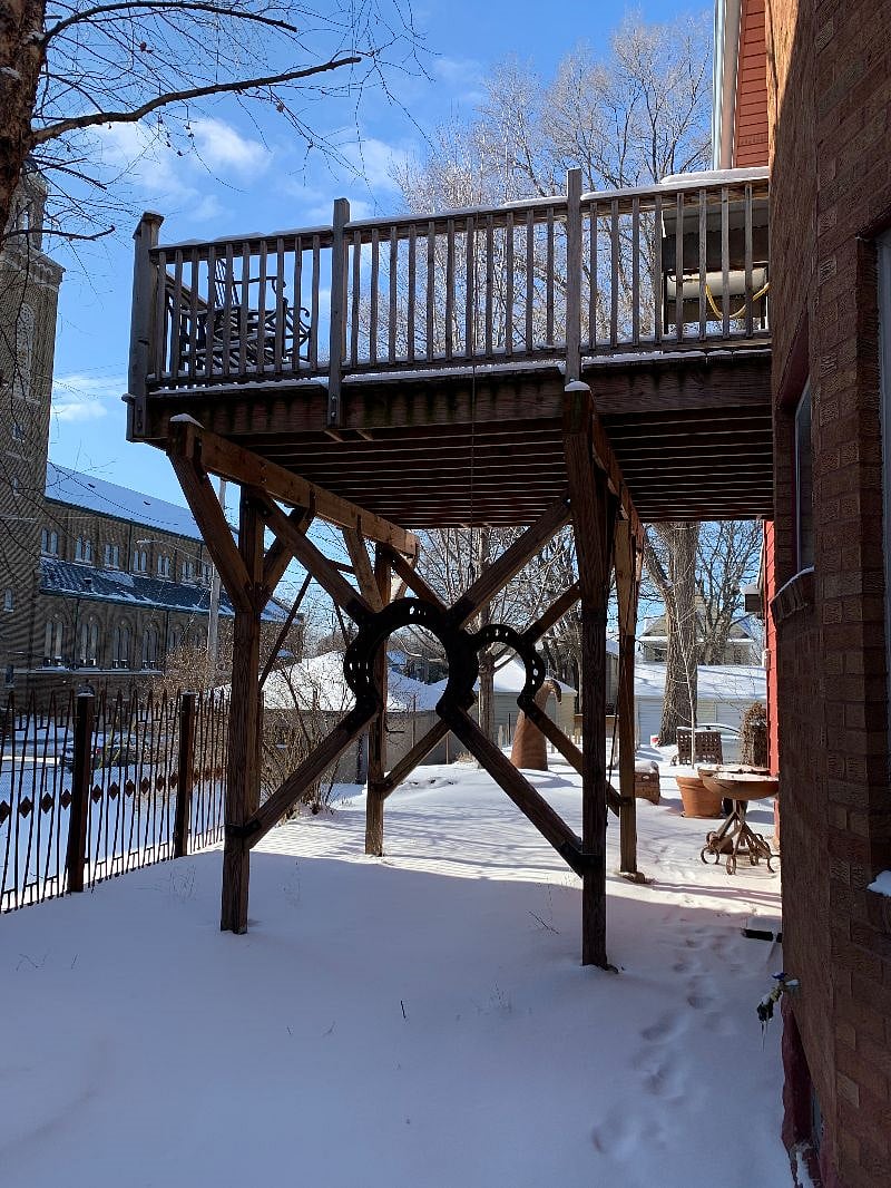 View of your deck from the ground. Designed by metal artist who was a prior owner.