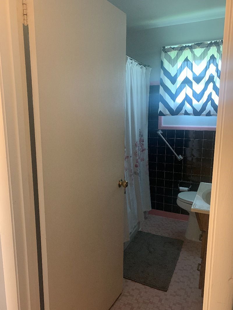 bath room #2-large storage closet behind the door