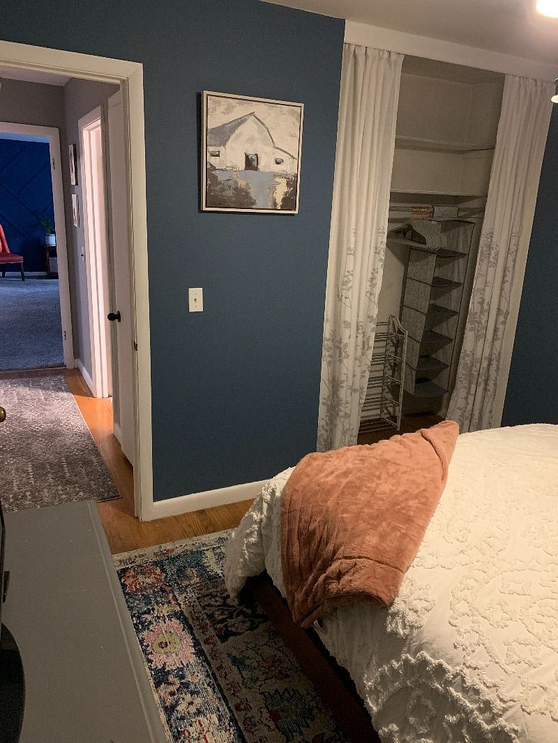 stocked linen/storage closet in the hall