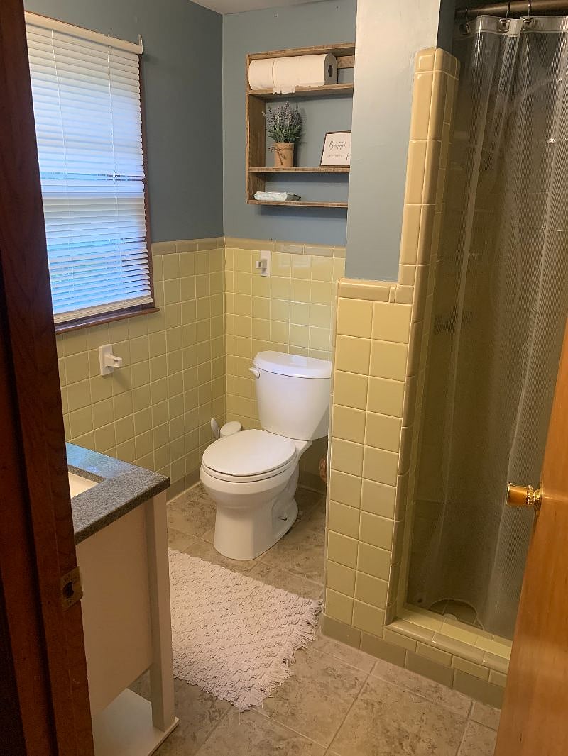 Bathroom with stand up shower off the kitchen