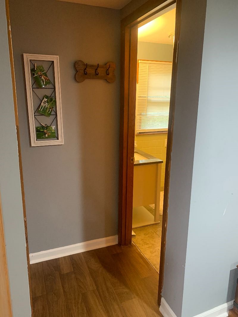 off kitchen, laundry to the left and bathroom #1 to the right