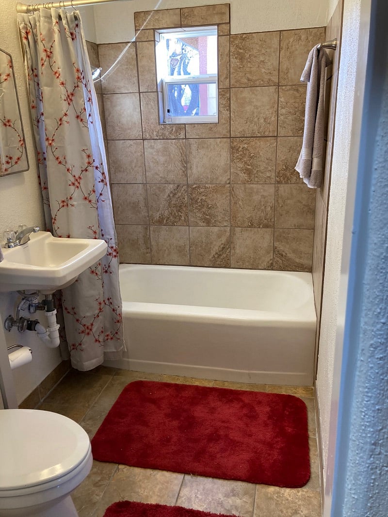 Original 1950s cast iron bath for long, luxurious soaks 