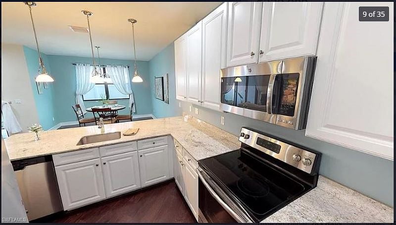 Large Kitchen overlooking Dining Room