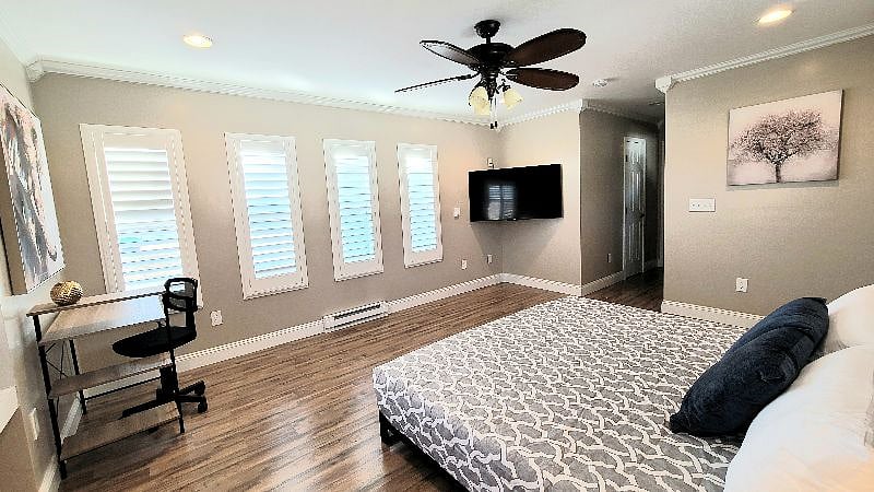 Private: Spacious Master King Bedroom includes personal smart flat screen TV.