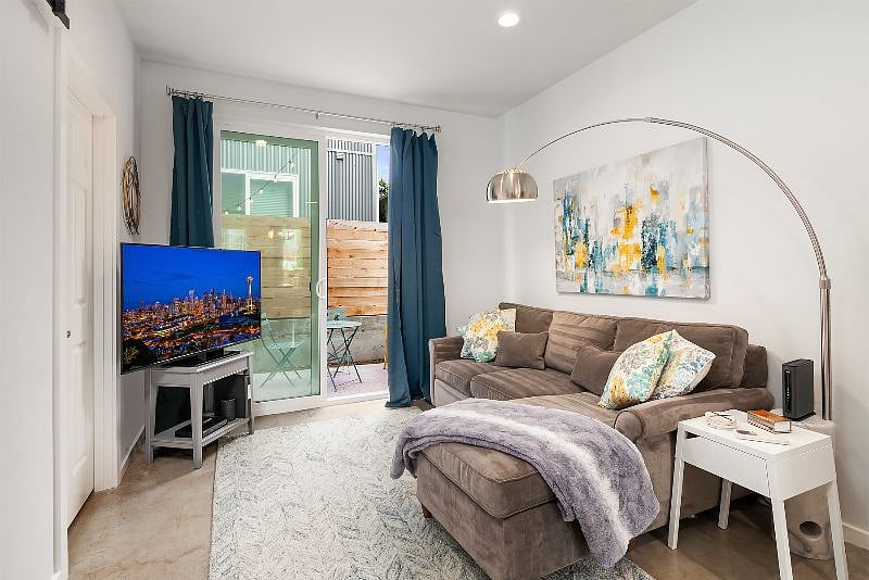 Living room, powder room, and patio access - 1st Floor