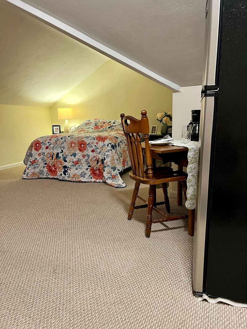 Full-sized, double pillowtop bed, dual three-drawer night stands for storage. Multiple outlets for charging.