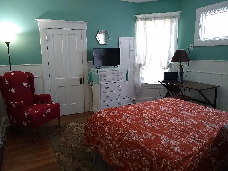 Smart TV, wifi included, closet, dresser and a desk.