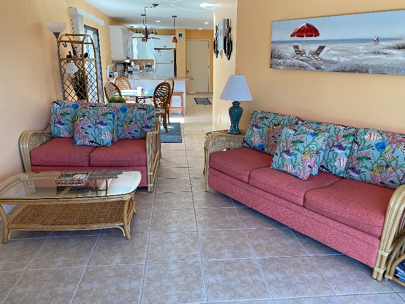 Living room looking toward dining area, peninsula, and kitchen