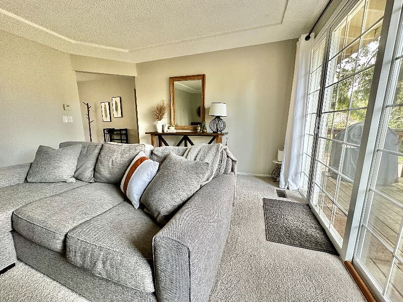 Living room with 65" smart TV with entry to deck overlooking large fenced in backyard.
View video walk through here:
https://youtu.be/dNdPRkJrlbo