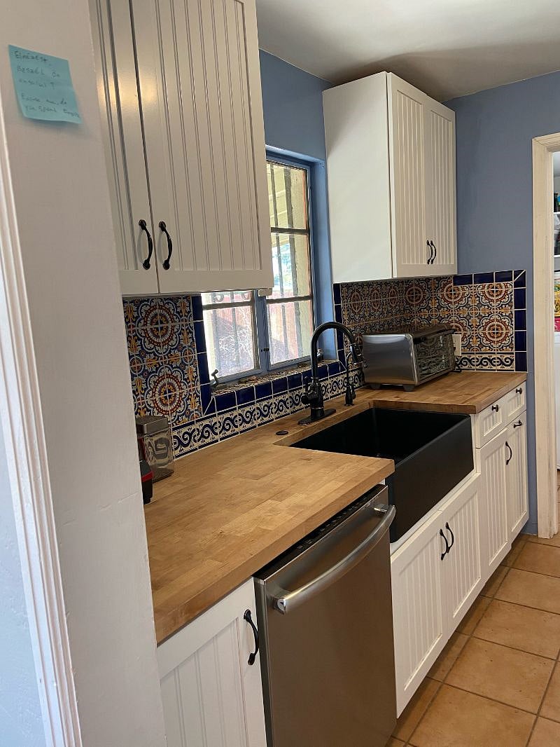 Stocked kitchen with a dishwasher, vitamix, coffee station, toaster
