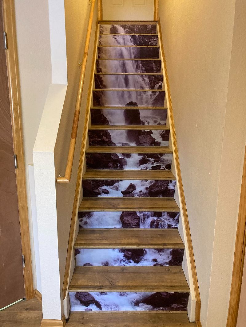 Stairs to upstairs owner's unit. Door at top of stairs stays locked.