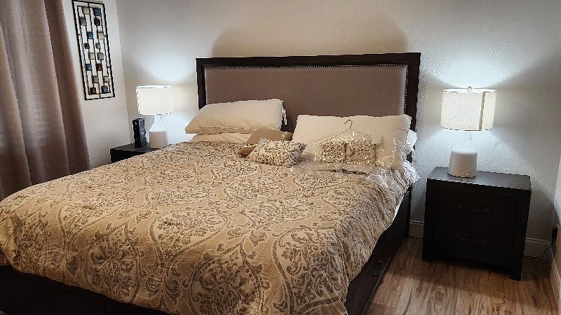 2nd BR showing side tables, lamp decor