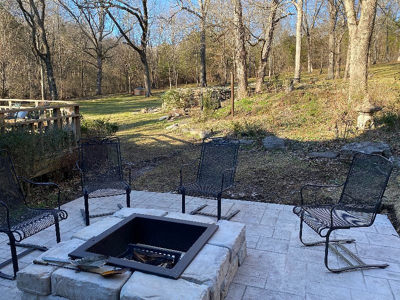 Woodburning fire pit with wood furnished 