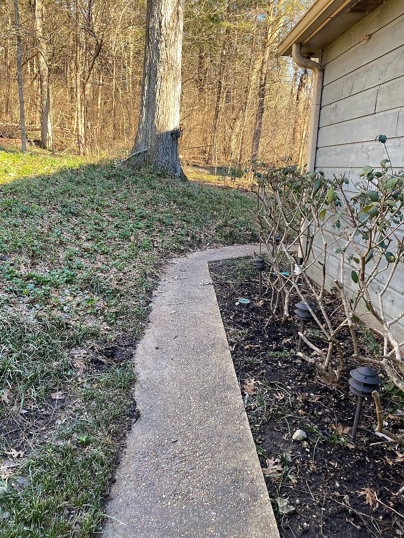Sidewalk from apartment to covered patio
