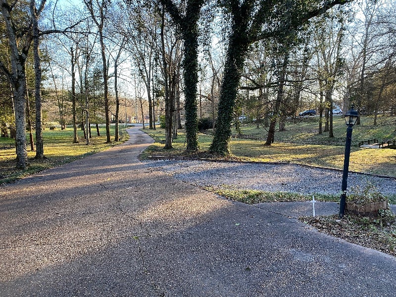 Front Drive showing distance from roadway to your secluded getaway :)