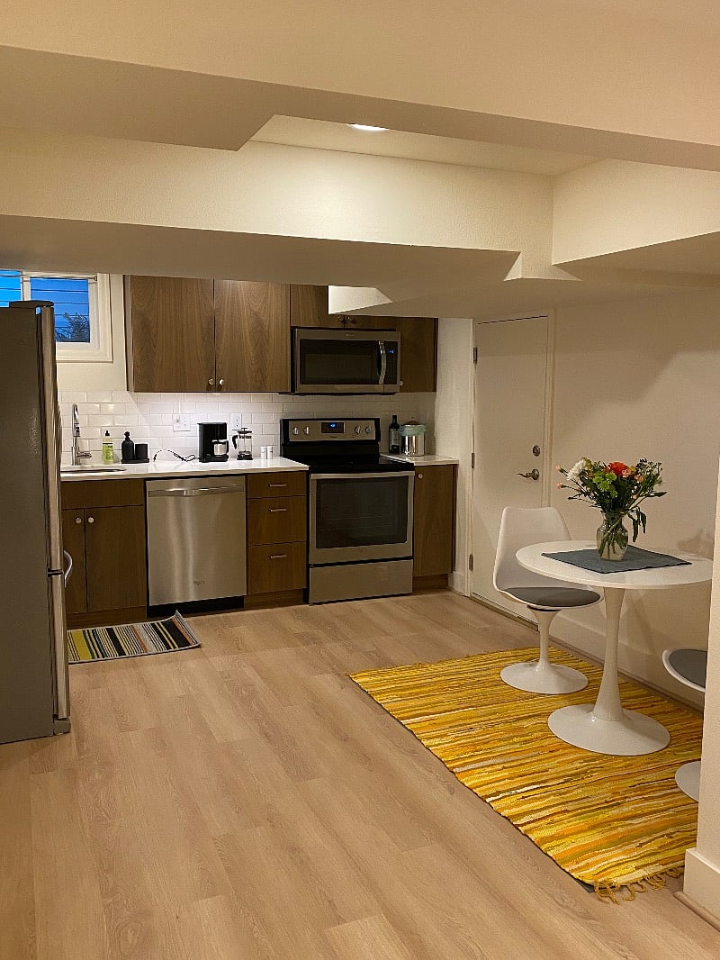 Quartz countertops, stainless oven, full sized refrigerator and dishwasher.