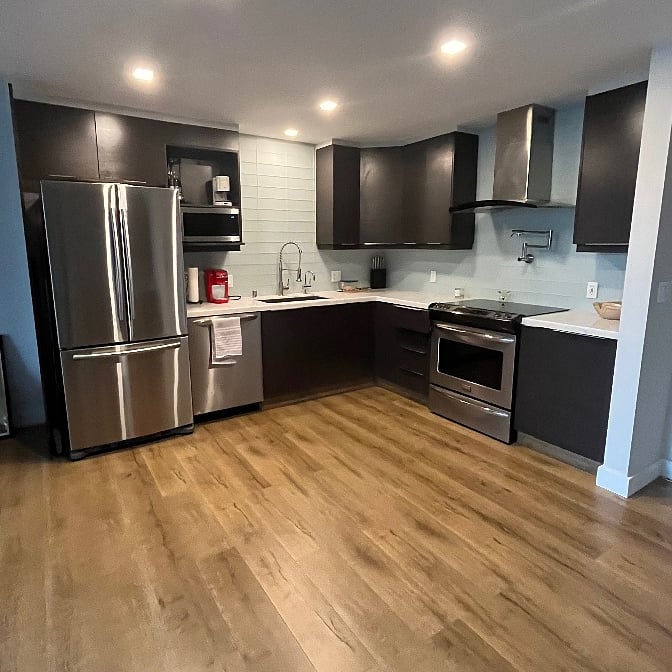 Full Kitchen - Fridge, dishwasher, electric range, garbage disposal, coffee makers, blender, few dishes and cooking stuff.