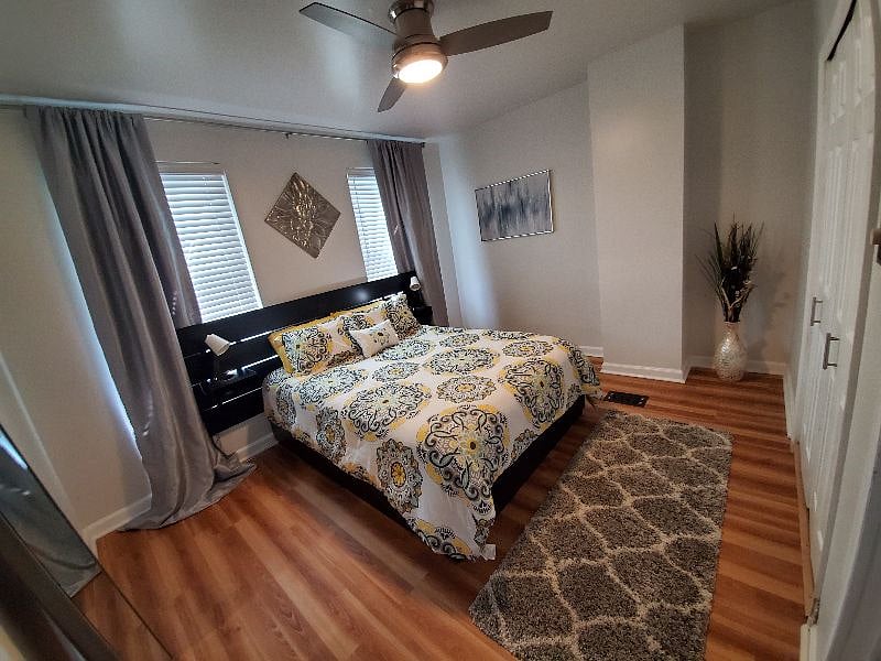 Master Bedroom (upstairs) featuring queen bed with 6 full drawers in bottom