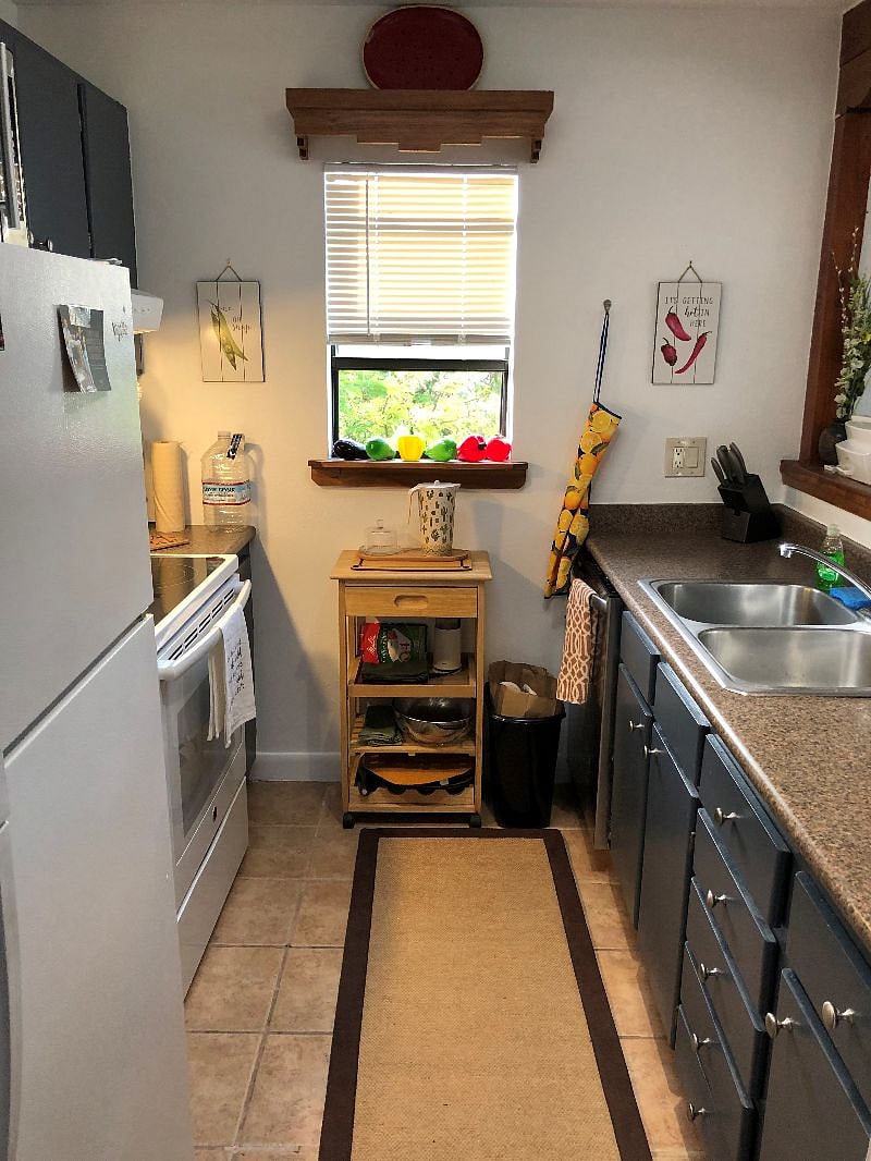 Dishwasher, dual sink and lovely little window!