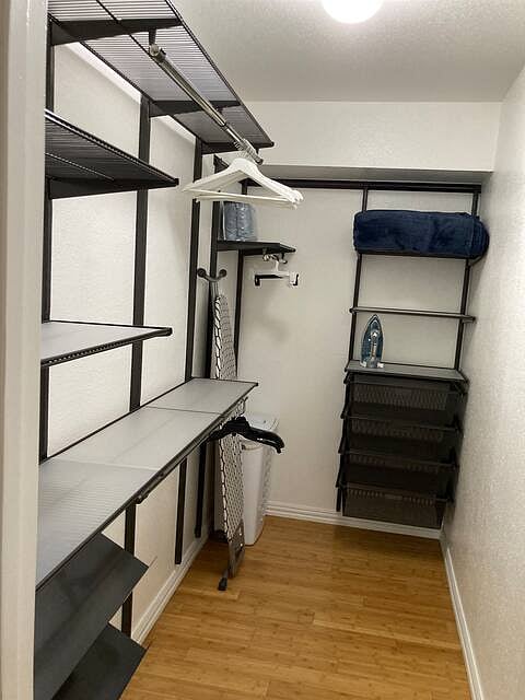 Custom-designed closet. Lots of storage for your luggage and designer clothes. Red suite has full-size ironing board, iron, laundry basket and extra blanket for your comfort and convenience.