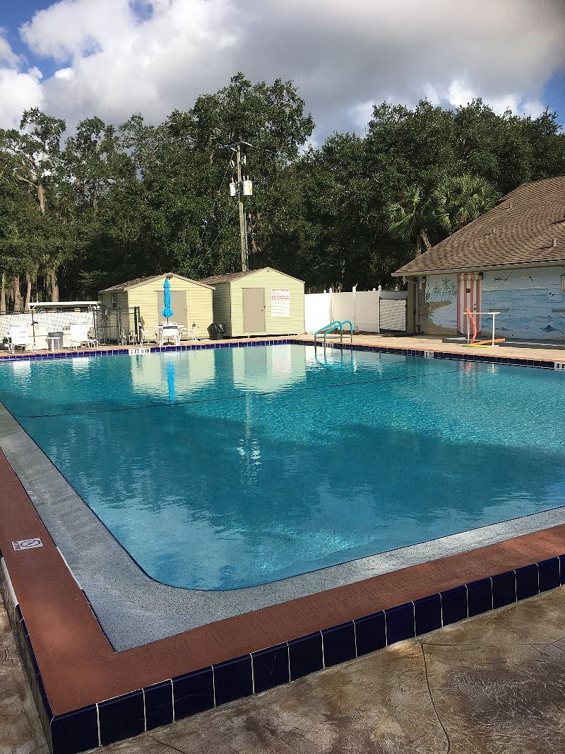 Heated, Olympic size pool at the Rec Center.
Check out Oakhollowpoa.com for more info and photos.