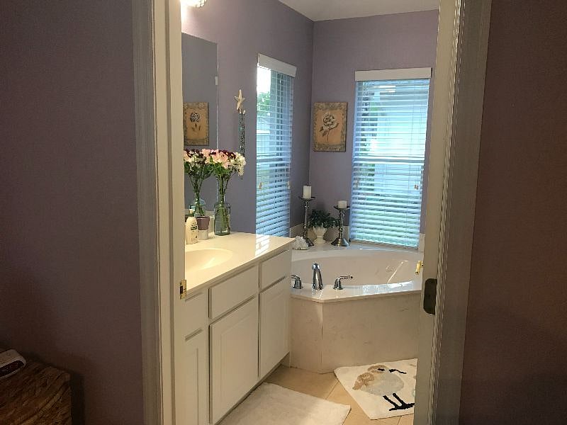 Master bath has soaking tub and separate stall shower. Walk-in closet.