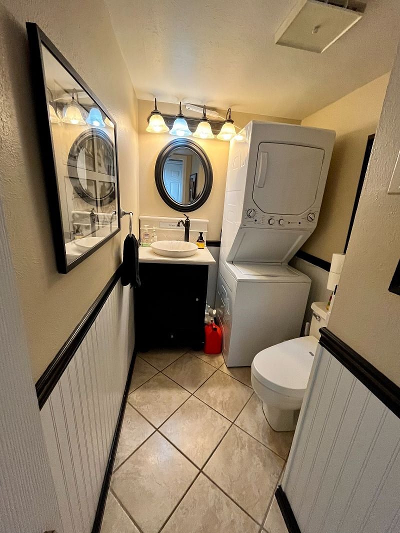 Main floor bathroom with washer and dryer