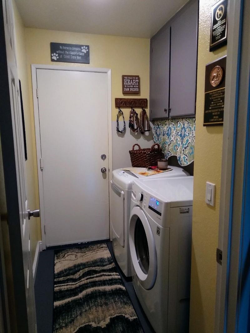 Laundry room with iron and steamer available. 
