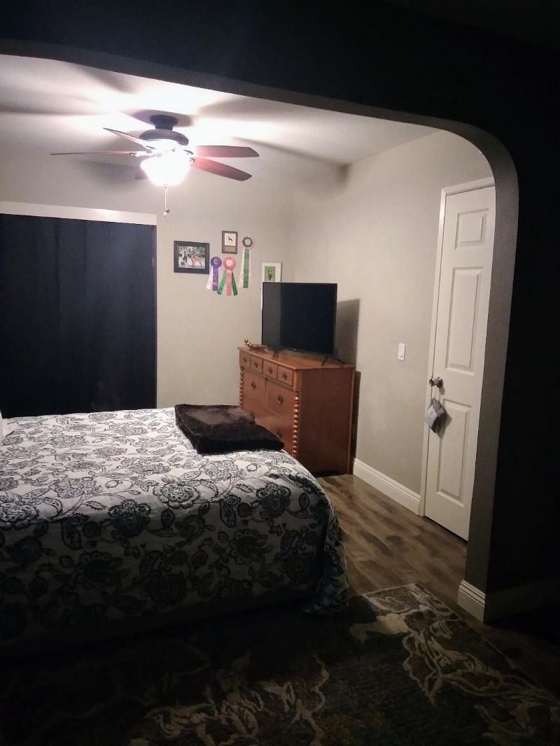 43inch smart TV and dresser and ceiling fan.