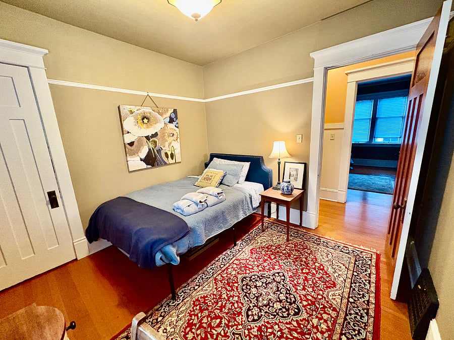 #4 - South Bedroom. Full size bed with computer desk and station (keyboard & Smart monitor)
