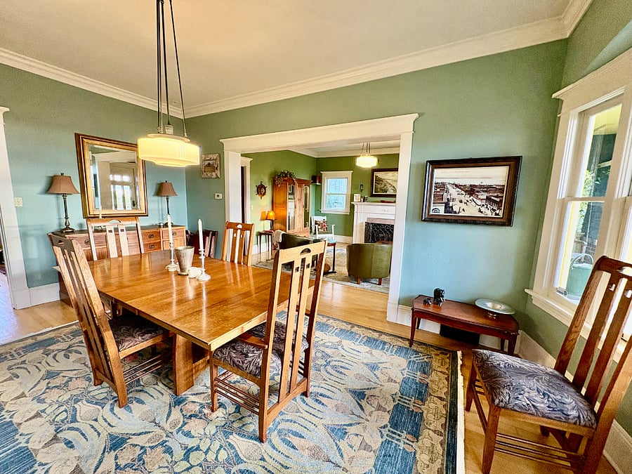 Dining room with table that seats 8-10 people.