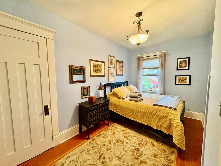 #2 - East Bedroom. Large walk in closet with full size bed