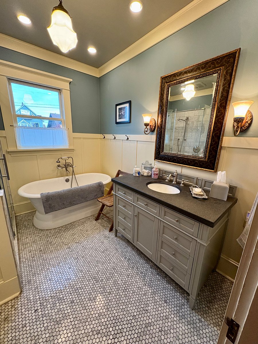 Upstairs newly remodeled bathroom. East facing, large walk in shower and soaking tub.