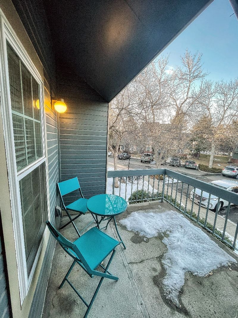 Spacious private patio for outdoor dining and extra storage