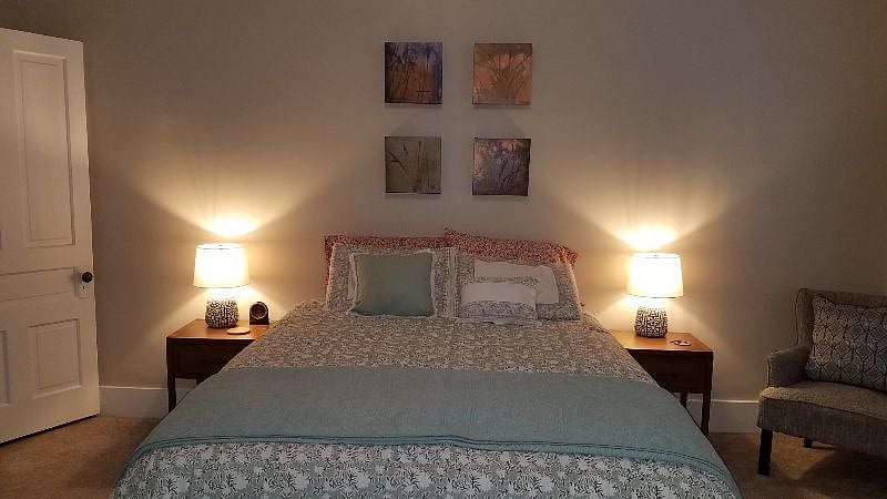 Queen Bed with all new sheets, pillows, throw, etc. 