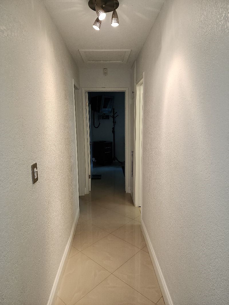Hallway leading to household bathroom master bedroom on the left and 3rd bedroom directly ahead. (3rd bedroom is currently set up as working office)