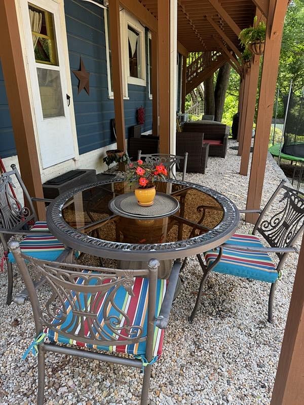 Additional outdoor living amenities include comfortable seating and a grill for your exclusive use.