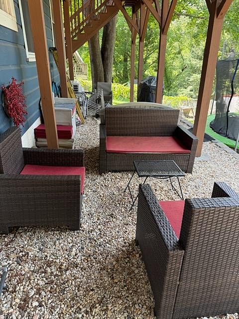 Additional outdoor living amenities include comfortable seating and a grill for your exclusive use.