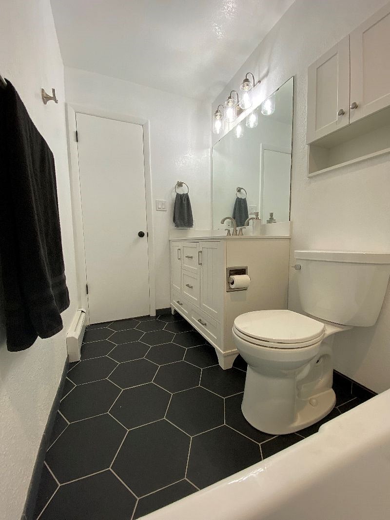 Full bathroom located upstairs
