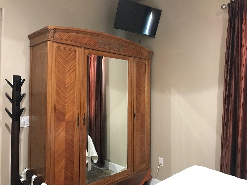 Extra large armoire and TV in bedroom.  Additional dresser for clothes is available as well.