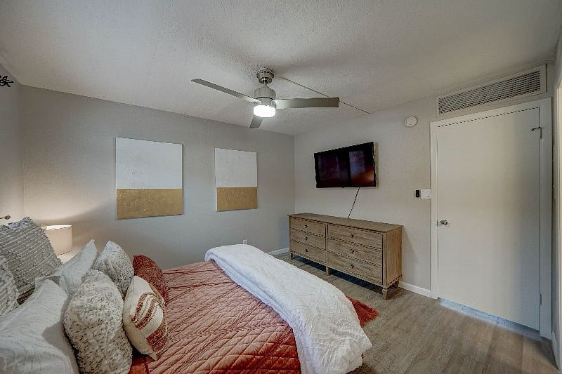 Queen sized bed, large dresser and a 50" Smart TV in the bedroom. Black out curtains have been added since photos were taken.