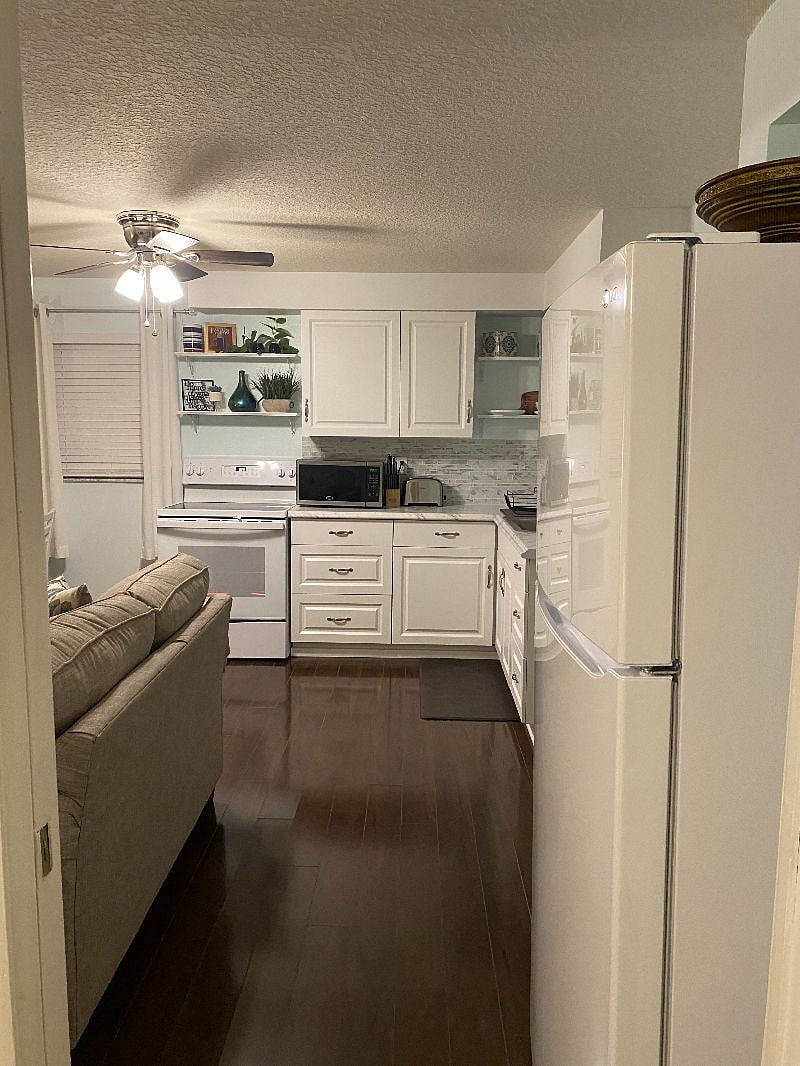 View from the bedroom into the living/kitchen area.