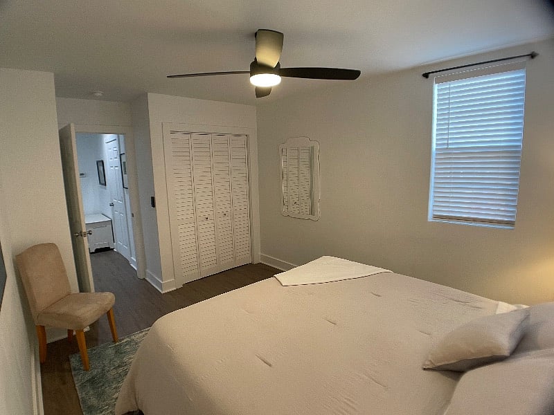 Master bedroom.
California King, organic Birch mattress w pillow topper, sound machine, essential oil diffuser, alarm clock.