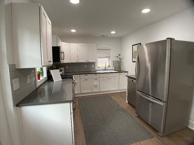 Kitchen.
Fully stocked with dishes, silverware, pots and pans, coffee makers, dishwasher, full sized refrigerator, range, microwave.