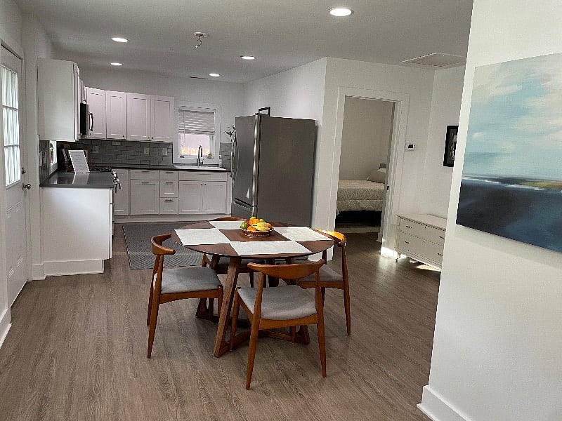Kitchen.
Fully stocked with dishes, silverware, pots and pans, coffee makers, dishwasher, full sized refrigerator, range, microwave.