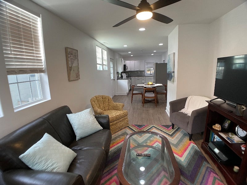 Living room.
Samsung smart tv, printer, loveseat, swivel chair, arm chairs.