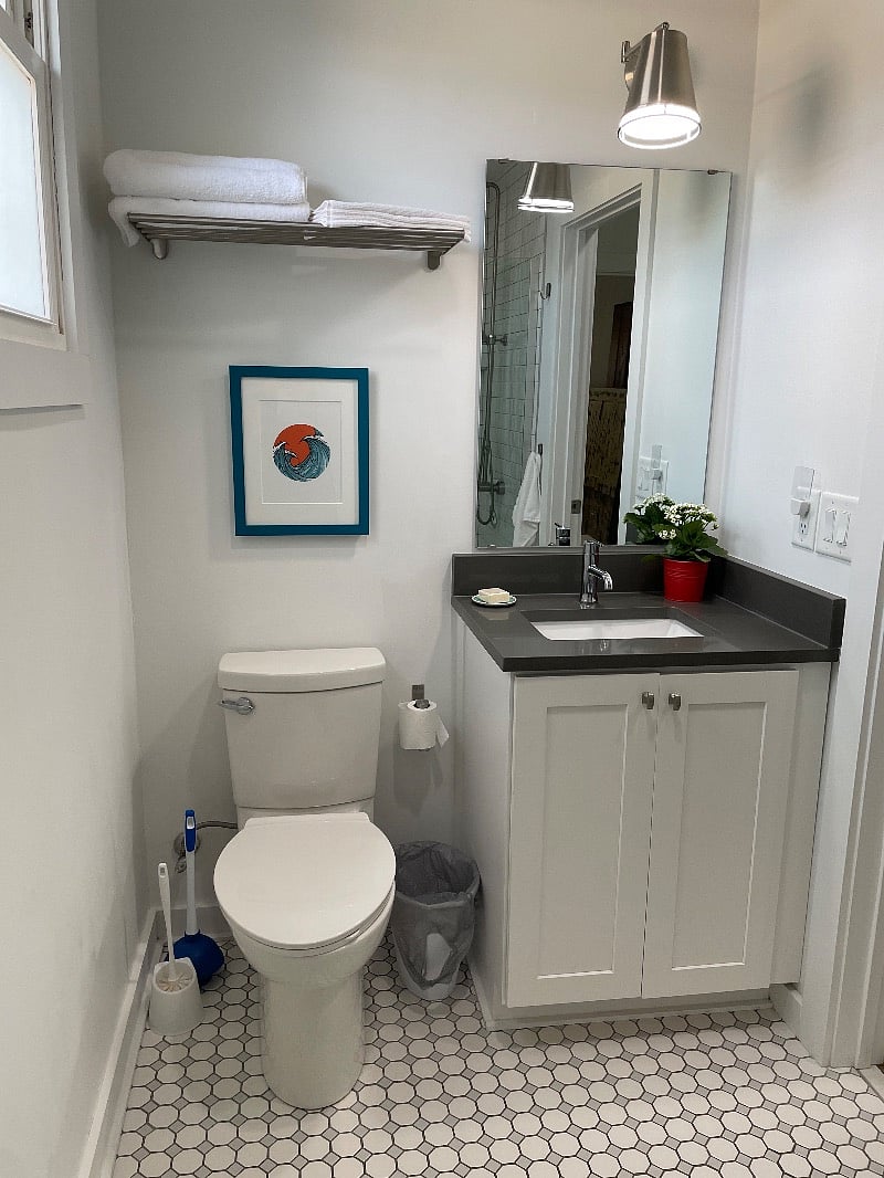 Full bathroom.
Spacious walk in shower with rain shower head.