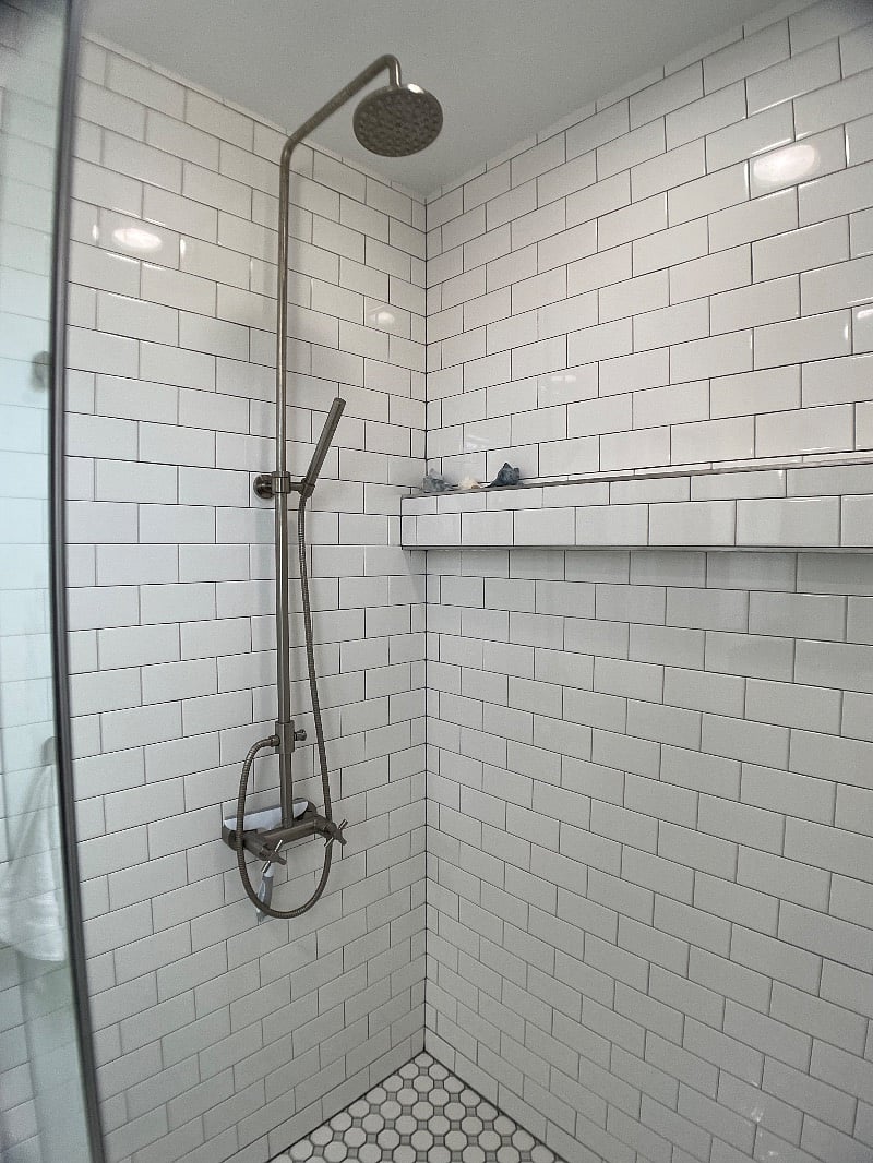Full bathroom.
Spacious walk in shower with rain shower head.