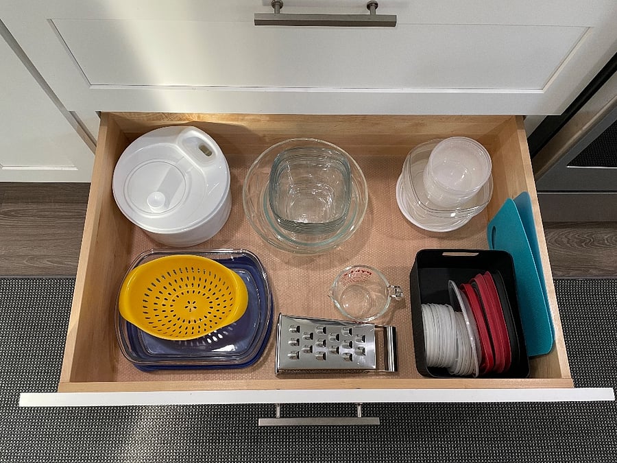 Kitchen.
Fully stocked with dishes, silverware, pots and pans, coffee makers, dishwasher, full sized refrigerator, range, microwave.